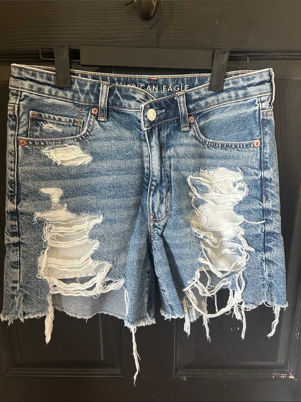 American Eagle Distressed Cross Over  Blue Denim Cutoff Shorts